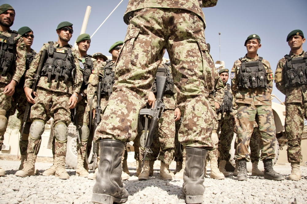 Afghan Air Force members get briefed on an exercise in Afghanistan Canvas Art - Stocktrek Images (35 x 23)