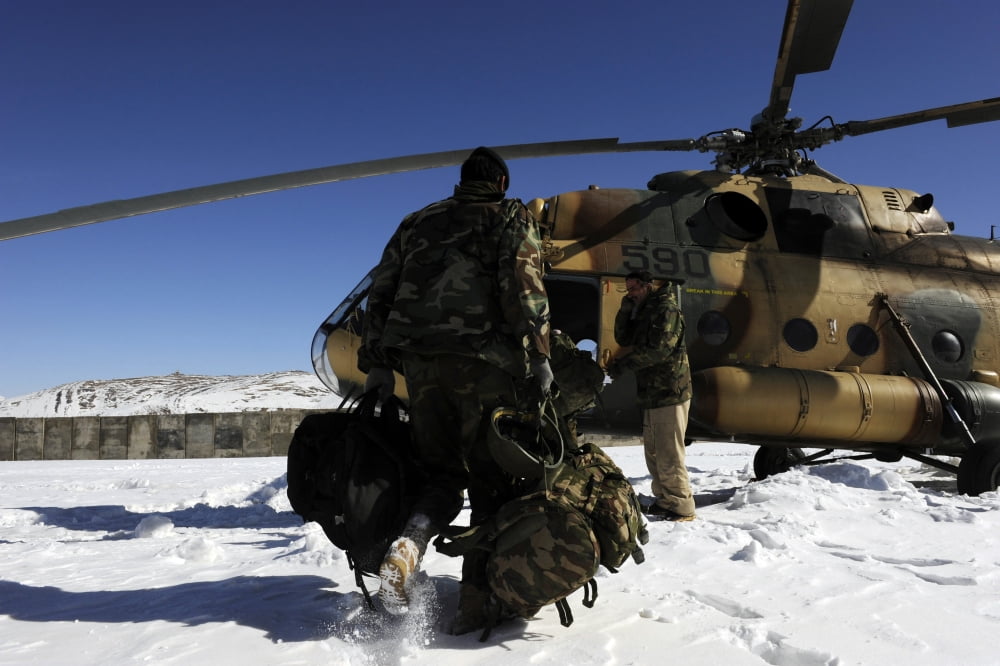 Afghan National Army Air Corps members board a Mi-17 helicopter Canvas Art - Stocktrek Images (34 x 23)