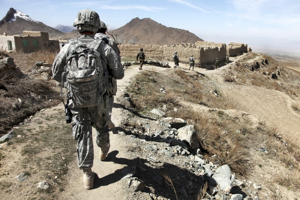 Afghan National Army and US soldiers patrol the village of Akbar Kheyl Afghanistan Canvas Art - Stocktrek Images (34 x 23)