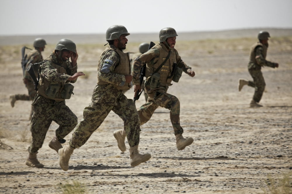 Afghan National Army soldiers run to their assigned positions Afghanistan Canvas Art - Stocktrek Images (35 x 23)