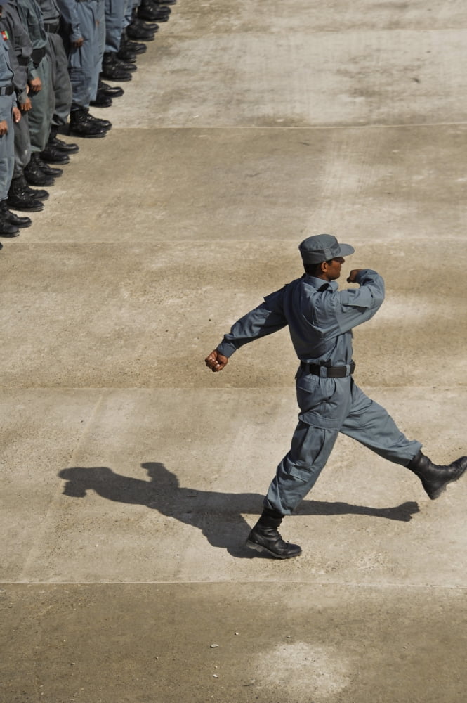 Afghan National Policemen participate in a graduation ceremony in Afghanistan Canvas Art - Stocktrek Images (23 x 34)