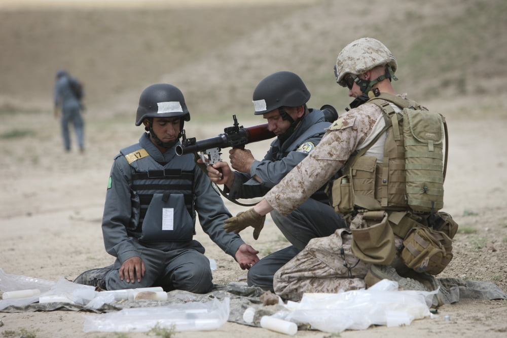 Afghan Police students assemble a RPG-7 grenade launcher Canvas Art - Terry MooreStocktrek Images (35 x 24)