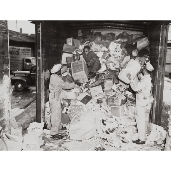 African American Soldiers Loading Trash On A Freight Car During World War 2. Many Blacks Were Assigned To Non-Combat