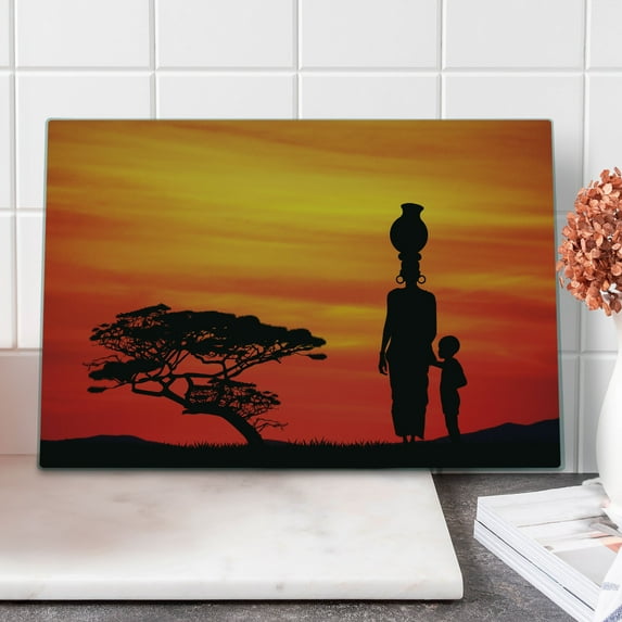 African Cutting Board, Rural Countryside Landscape Mother and at Sunset Tree Print, Decorative Tempered Glass Cutting and Serving Board, Large Size, Scarlet Yellow and Black, by Ambesonne