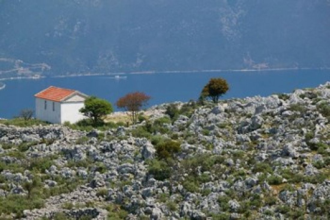 Agia Sofia Church and Ithaki Landscape Karia Kefalonia Ionian Islands Greece Canvas Art - Walter Bibikow DanitaDelimont (28 x 19)