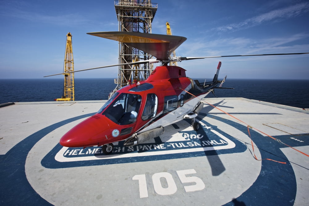 AgustaWestland AW109E utility helicopter on the helipad of an oil rig Canvas Art - Terry MooreStocktrek Images (18 x 12)
