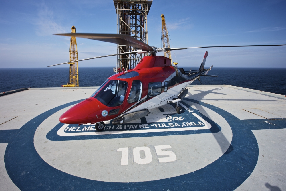 AgustaWestland AW109E utility helicopter on the helipad of an oil rig Canvas Art - Terry MooreStocktrek Images (18 x 12)