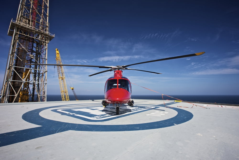 AgustaWestland AW109E utility helicopter on the helipad of an oil rig Canvas Art - Terry MooreStocktrek Images (18 x 12)