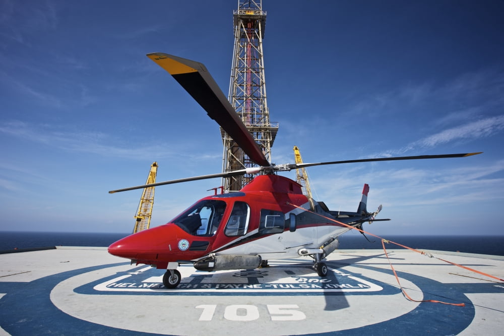 AgustaWestland AW109E utility helicopter on the helipad of an oil rig Canvas Art - Terry MooreStocktrek Images (34 x 23)