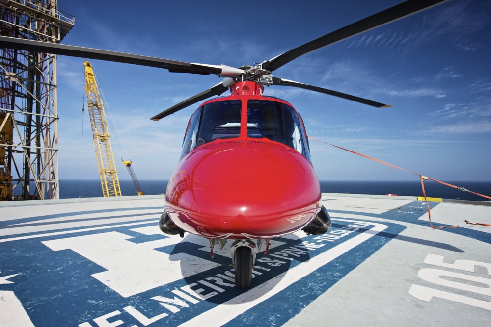 AgustaWestland AW109E utility helicopter on the helipad of an oil rig Canvas Art - Terry MooreStocktrek Images (35 x 24)