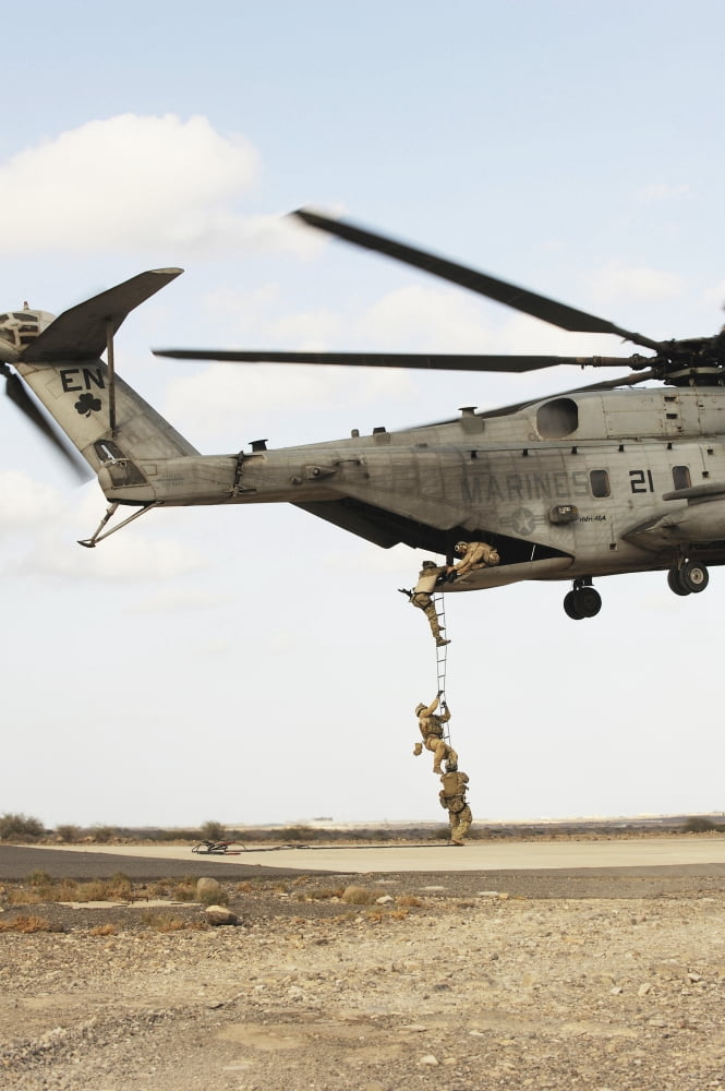 Air Force pararescuemen conduct a combat insertion and extraction exercise in Djibouti Africa Canvas Art - Stocktrek Images (23 x 34)