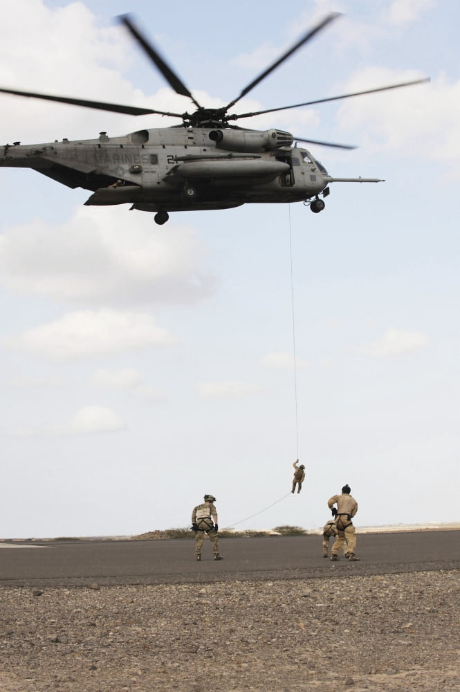 Air Force pararescuemen conduct a combat insertion and extraction exercise in Djibouti Africa Canvas Art - Stocktrek Images (23 x 34)