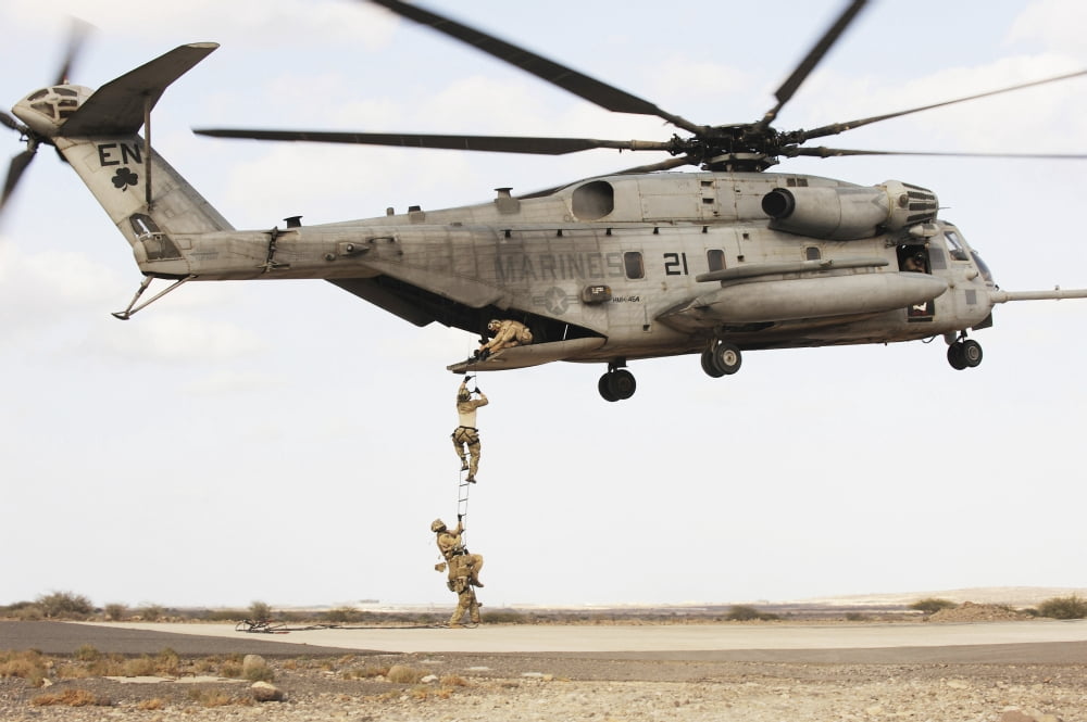 Air Force pararescuemen conduct a combat insertion and extraction exercise in Djibouti Africa Canvas Art - Stocktrek Images (34 x 23)