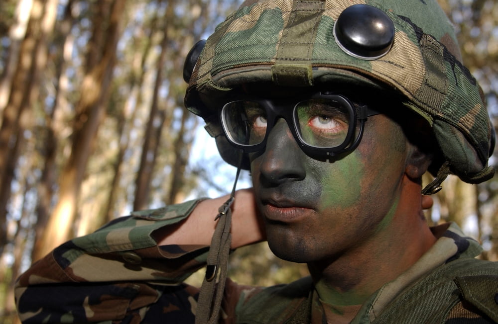 Airman applies camouflage make-up Canvas Art - Stocktrek Images (34 x 22)
