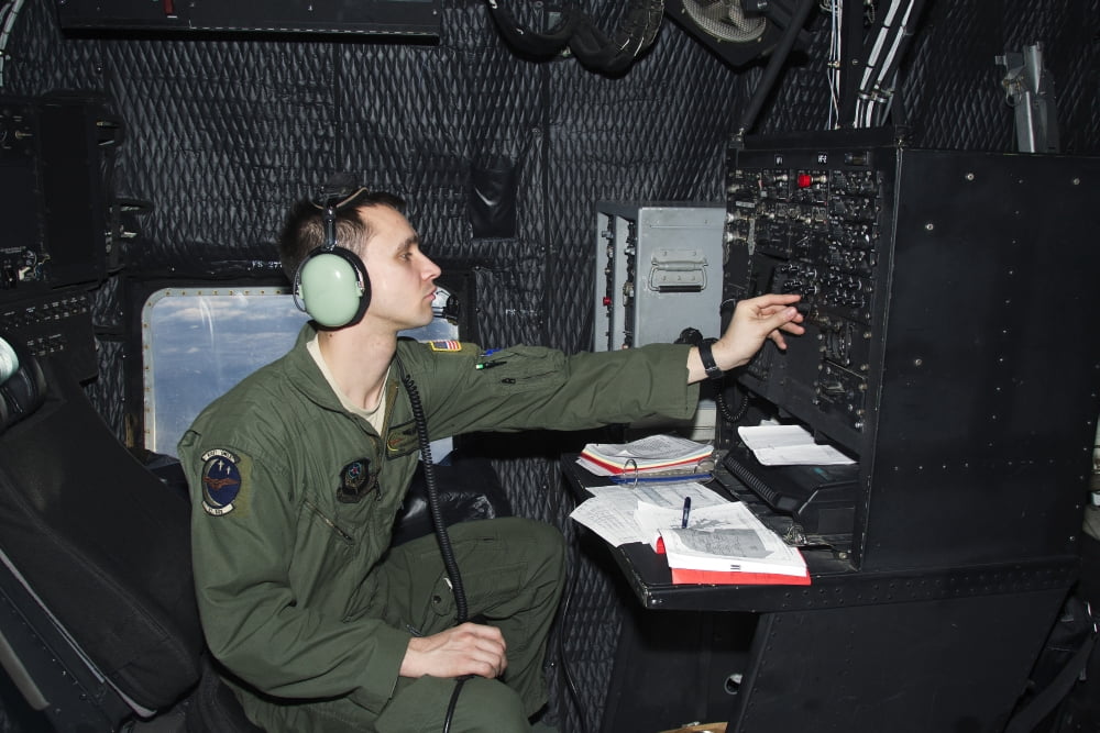 Airman at work as Radio Operator in an MC-130P Combat Shadow Canvas Art - Gert KromhoutStocktrek Images (35 x 23)