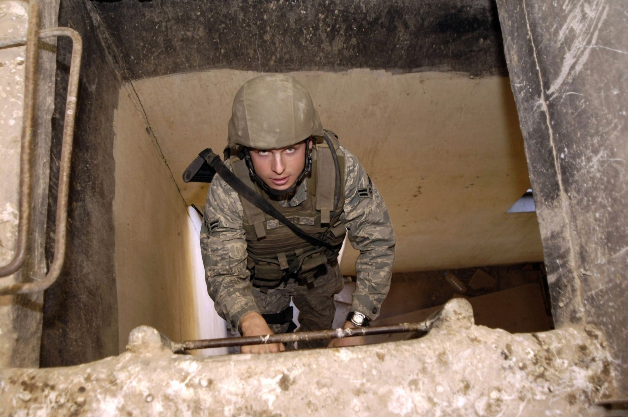 Airman climbs to the top of a lookout point Canvas Art - Stocktrek Images (34 x 23)