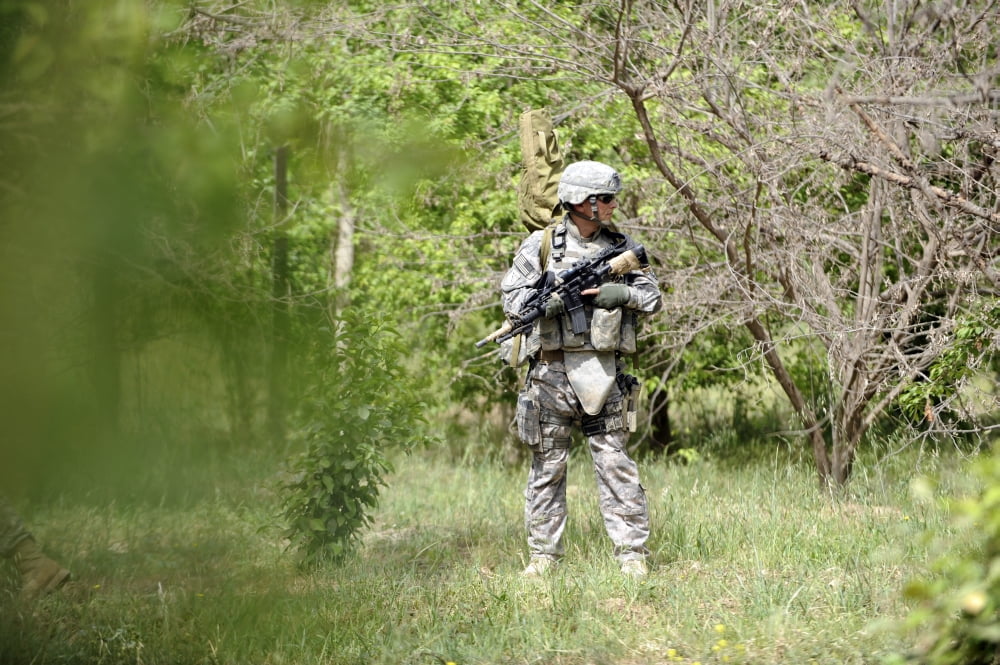 Airman conducts security during a patrol in Bakr Village Canvas Art - Stocktrek Images (34 x 23)