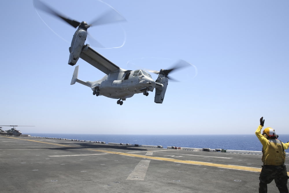 Airman directs the take-off an MV-22 Osprey Canvas Art - Stocktrek Images (35 x 23)