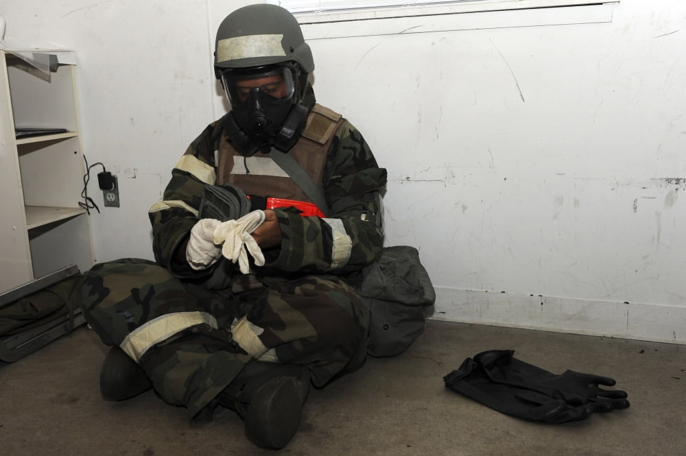 Airman dons his chemical warfare defense ensemble Canvas Art - Stocktrek Images (35 x 24)