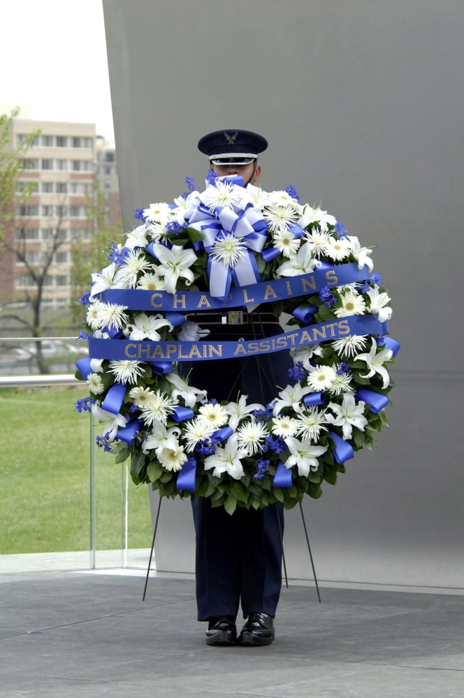 Airman holds a wreath during a ceremony Canvas Art - Stocktrek Images (23 x 34)