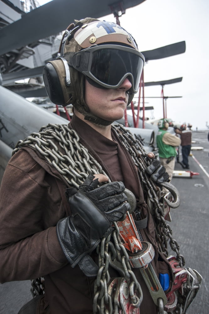 Airman observes flight operations aboard USS Carl Vinson Canvas Art - Stocktrek Images (23 x 34)