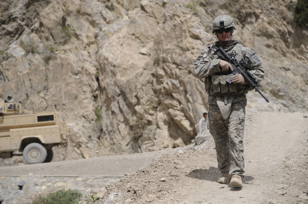 Airman provides security during combat operations Canvas Art - Stocktrek Images (34 x 23)