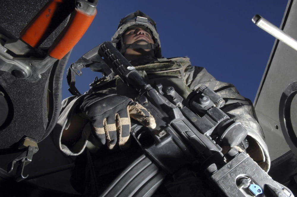 Airman stands guard during convoy operations Canvas Art - Stocktrek Images (34 x 23)