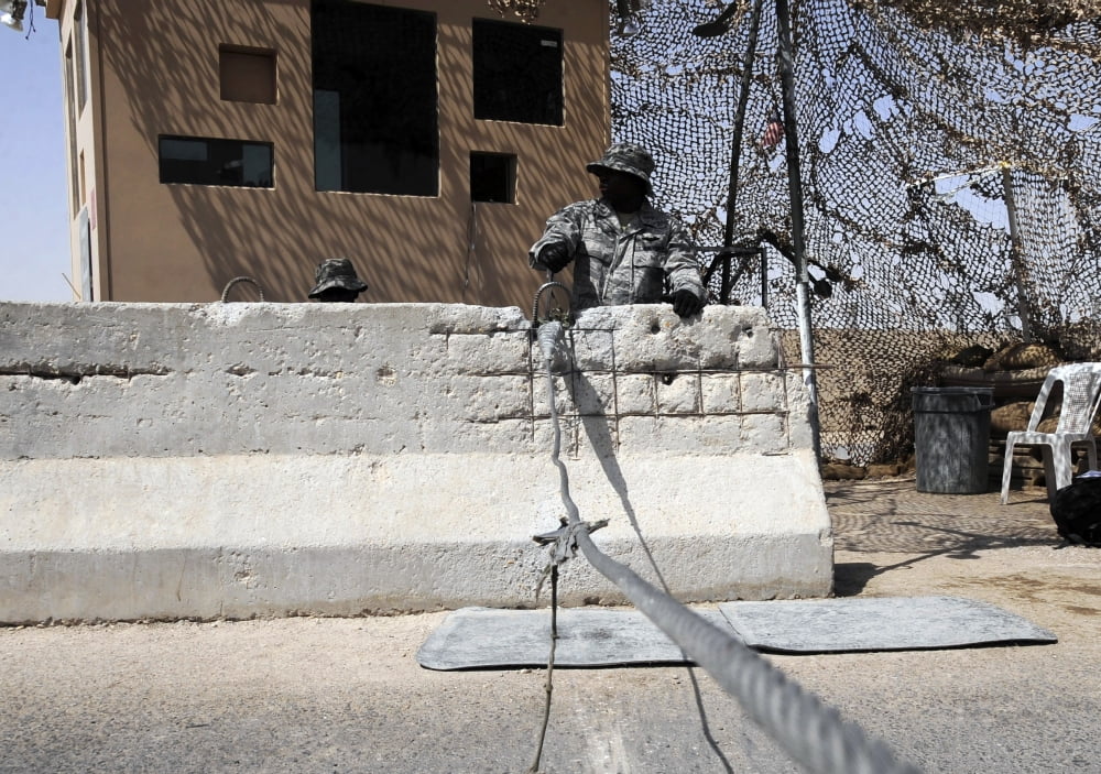 Airman stands post to the entry control point to Bedrock Canvas Art - Stocktrek Images (33 x 23)
