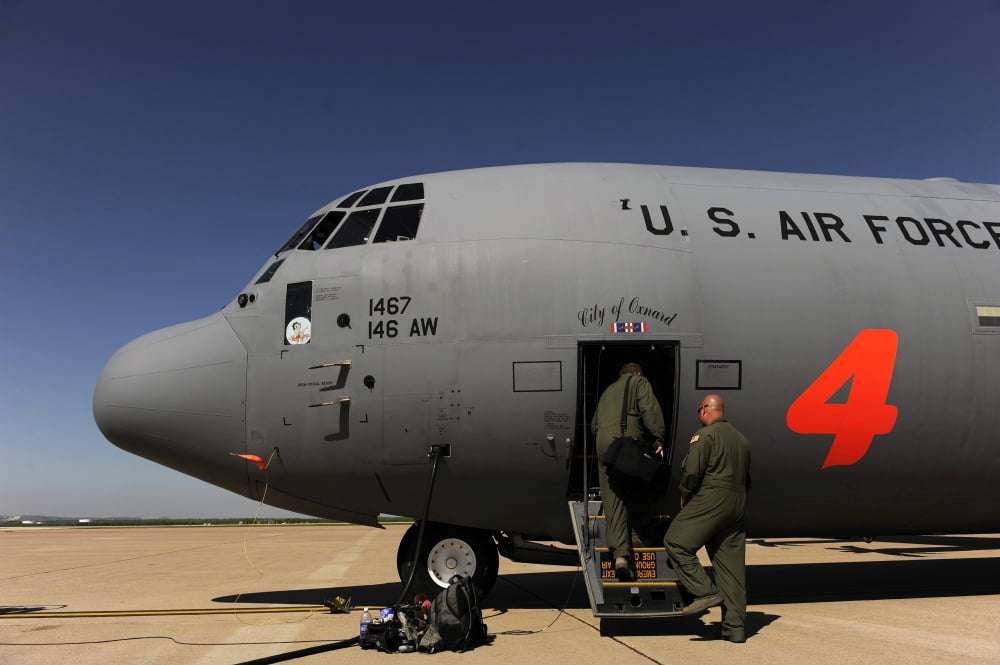 Airmen board a C-130J Hercules at Dyess Air Force Base Canvas Art - Stocktrek Images (35 x 23)