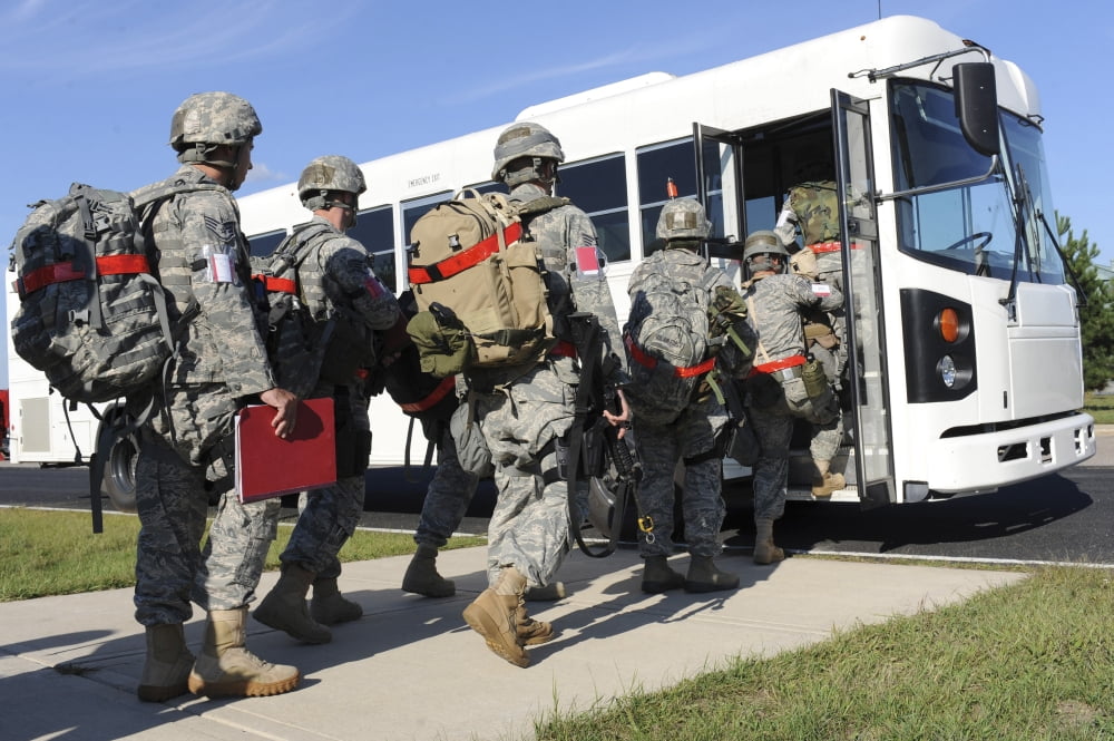 Airmen board a bus Canvas Art - Stocktrek Images (35 x 24)