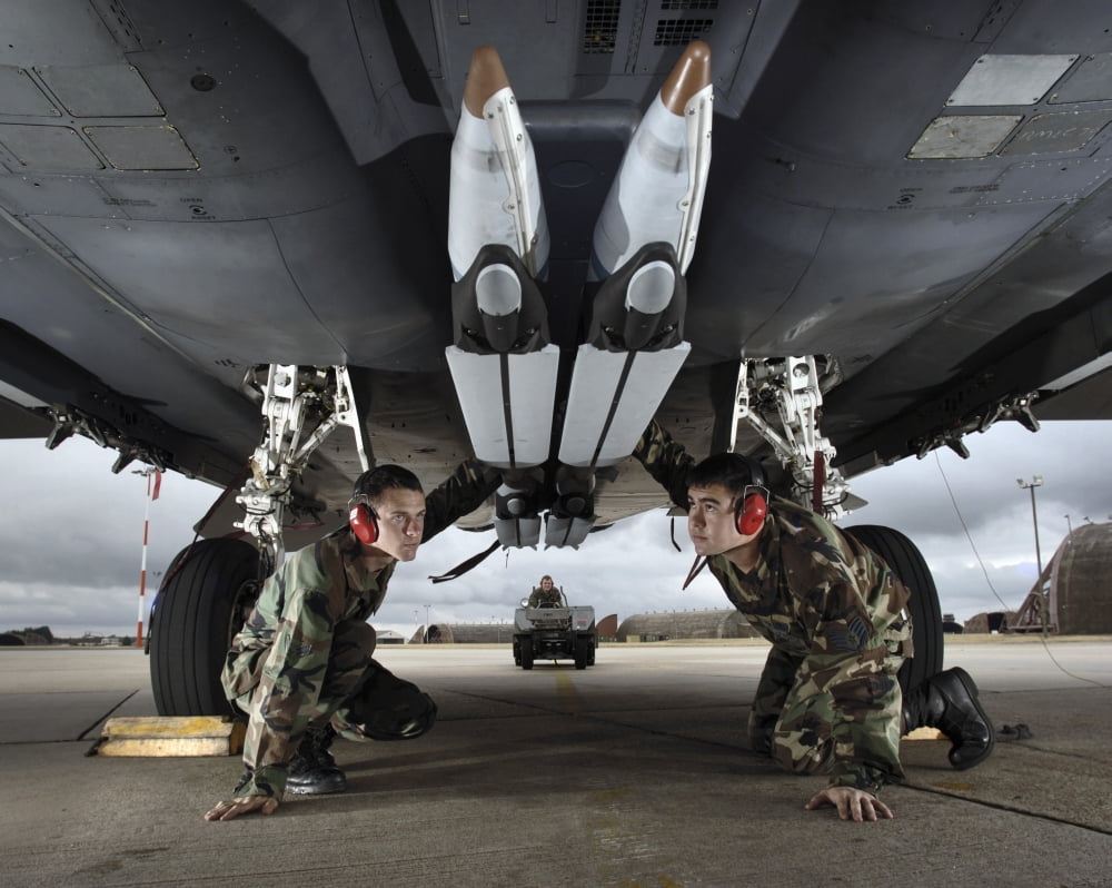 Airmen check the GBU-39 small diameter bombs loaded on an F-15E Strike Eagle Canvas Art - Stocktrek Images (31 x 25)