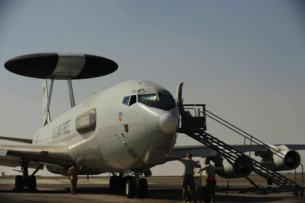 Airmen prepare a US Air Force E-3 Sentry aircraft for a mission Canvas Art - Stocktrek Images (35 x 23)