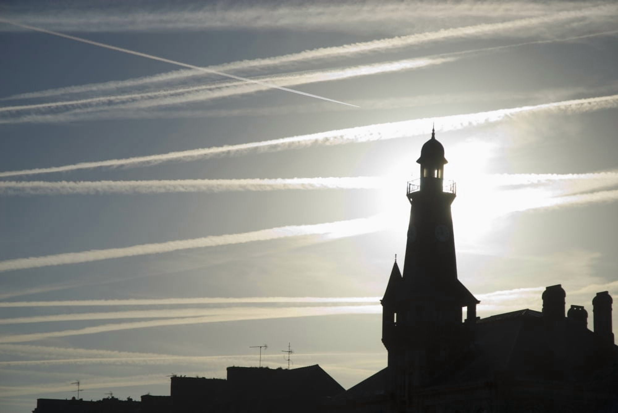 Airplane Contrails Above Lighthouse Canvas Art - Ian Cumming Design Pics (17 x 11)