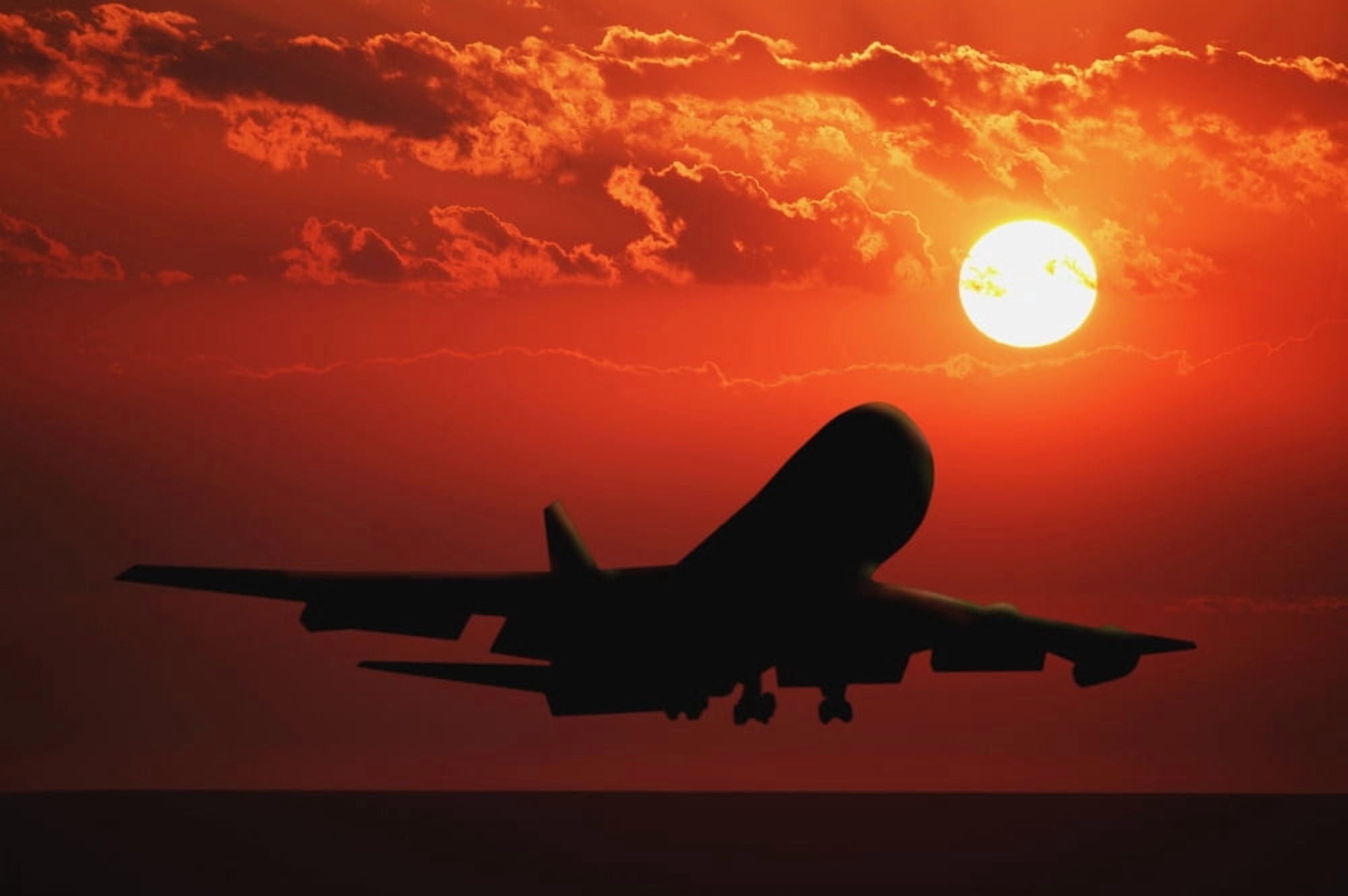 Airplane Landing At Sunset Canvas Art - Don Hammond Design Pics (17 x 11)