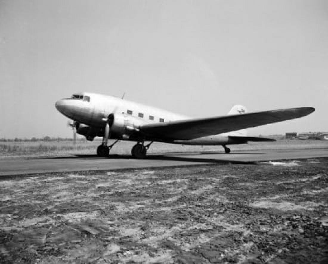 Airplane on a runway Canvas Art - (24 x 36)