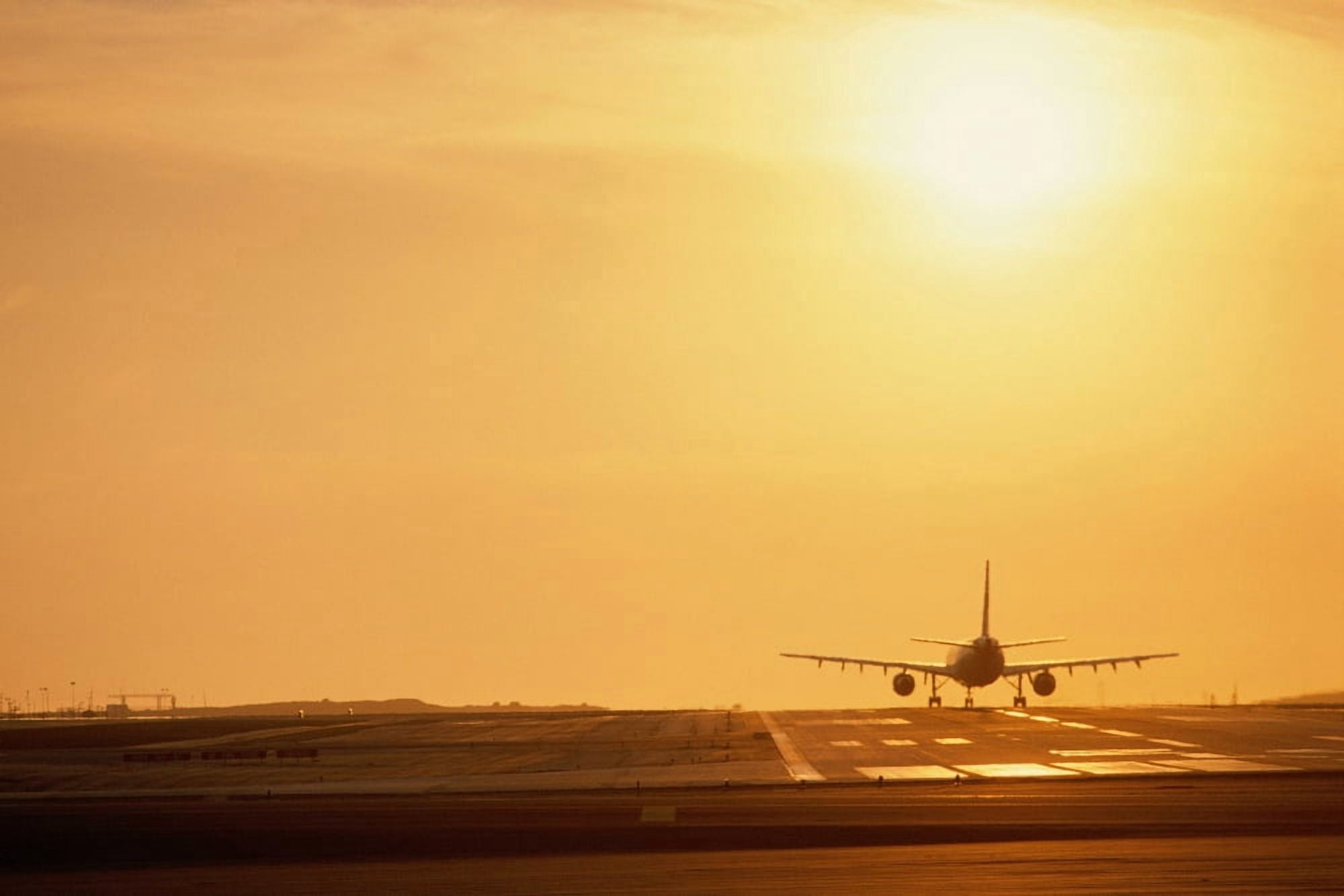 Airplane on runway Canvas Art - Panoramic Images (24 x 36)