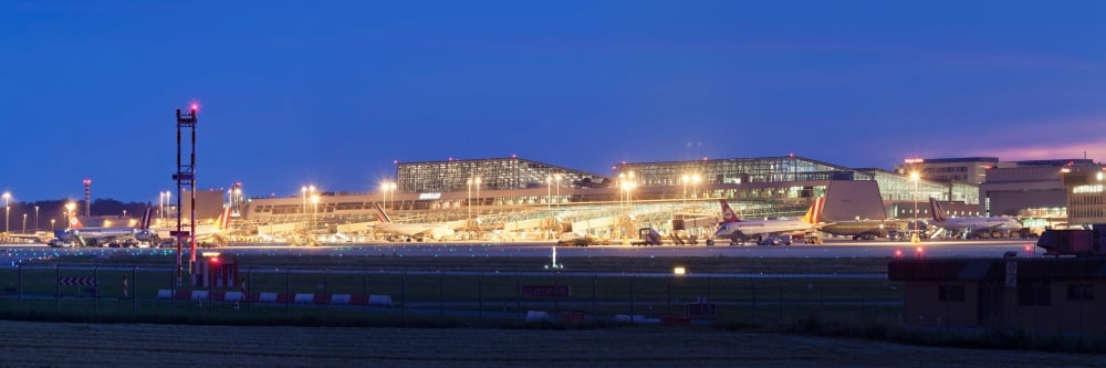 Airport at night Stuttgart Airport Stuttgart Baden-Wurttemberg Germany Canvas Art - Panoramic Images (27 x 9)