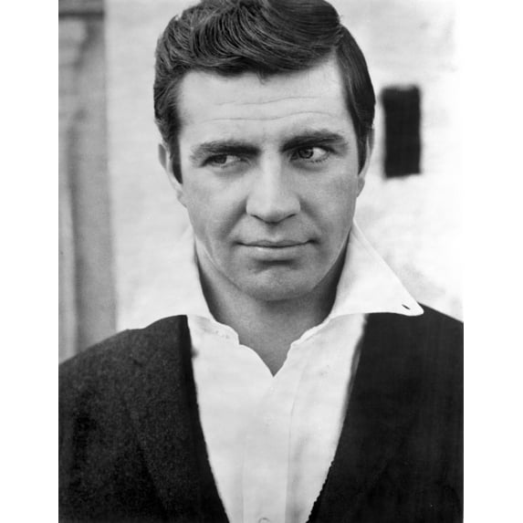 Alan Bates Posed in Black Suit With White Collar Photo Print (24 x 30)
