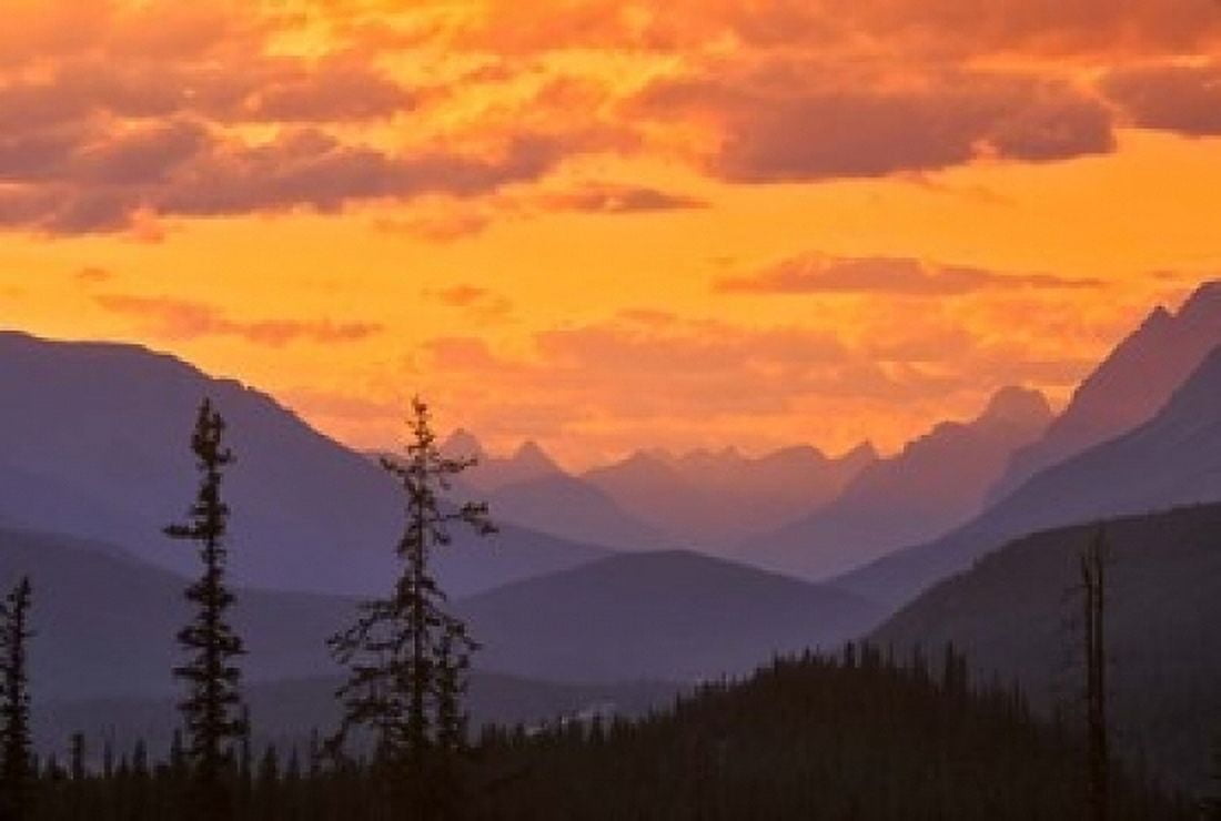 Alberta Baniff NP Sunset on Mountain ridges Canvas Art - Janis Miglavs DanitaDelimont (36 x 24)