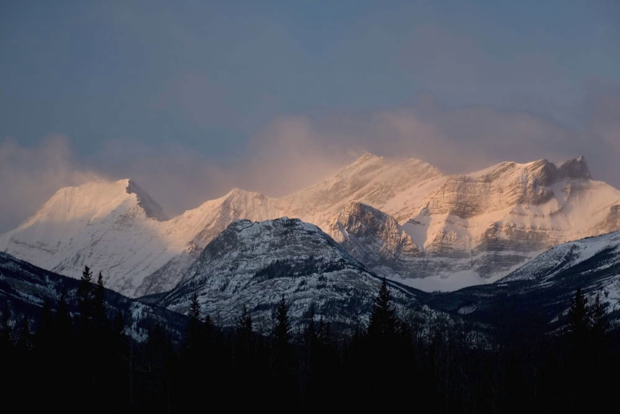 Alberta Canada Fog Around The Snow Covered Mountain Range At Sunrise In Kananaskis Country Canvas Art - Michael Interisano Design Pics (40 x 26)