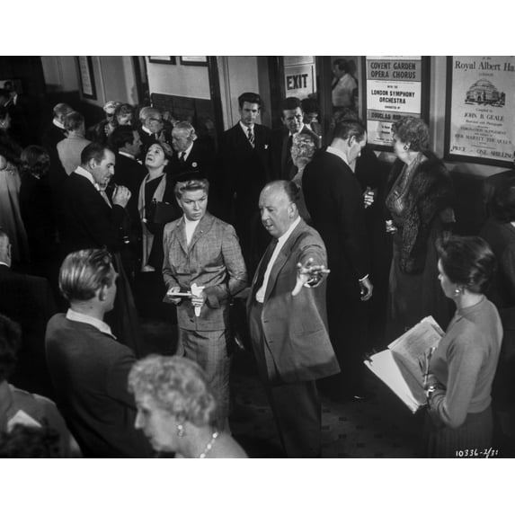 Alfred Hitchcock directing on a film set Photo Print (24 x 30)