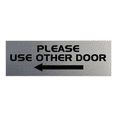 thumbnail image 1 of All Quality PLEASE USE OTHER DOOR Sign - (Left Arrow) (Brushed Silver) Small 2" x 6", 1 of 5