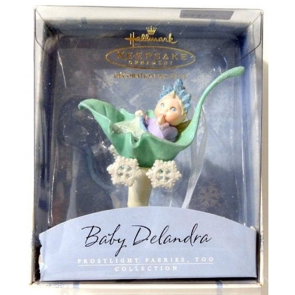 All snuggled in her stroller bed, how safe and warm Delandra feels! The winter breeze seems soft because she drifts along on snowflake wheels.