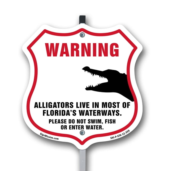 Alligator Warning Warning Alligators Live In Most Of Florida's Waterways. Please Do Not Swim Fish Or Enter Water 12 inch X 12 inch Shield Shaped Plastic Sign with Aluminum Mounting