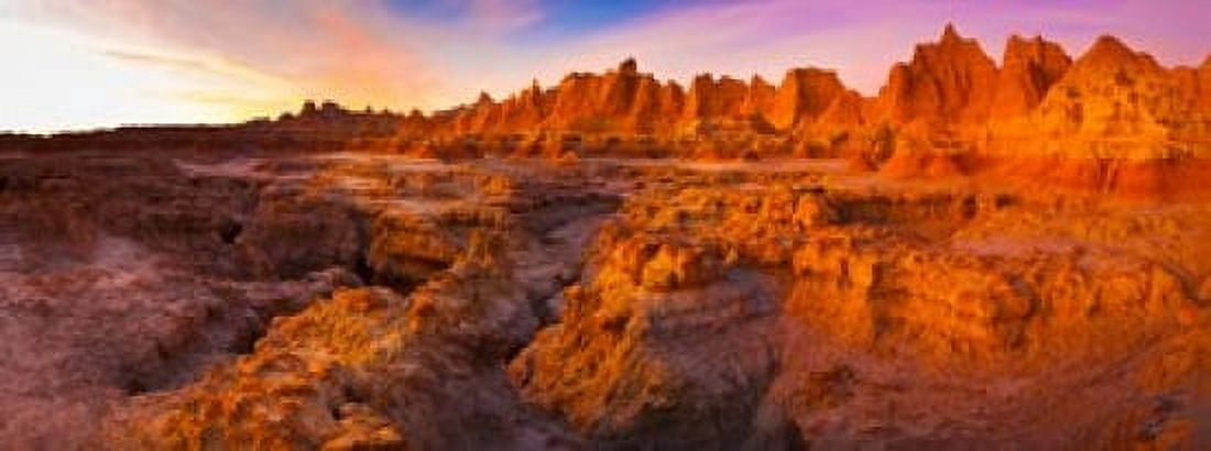 Alpenglow on rock formations at sunrise Door Trail Badlands National Park South Dakota USA Canvas Art - Panoramic Images (15 x 6)
