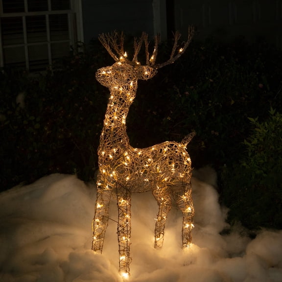 Alpine Corporation 24"L x 10"W x 49"H Standing Rattan Reindeer Decoration with White Halogen Lights