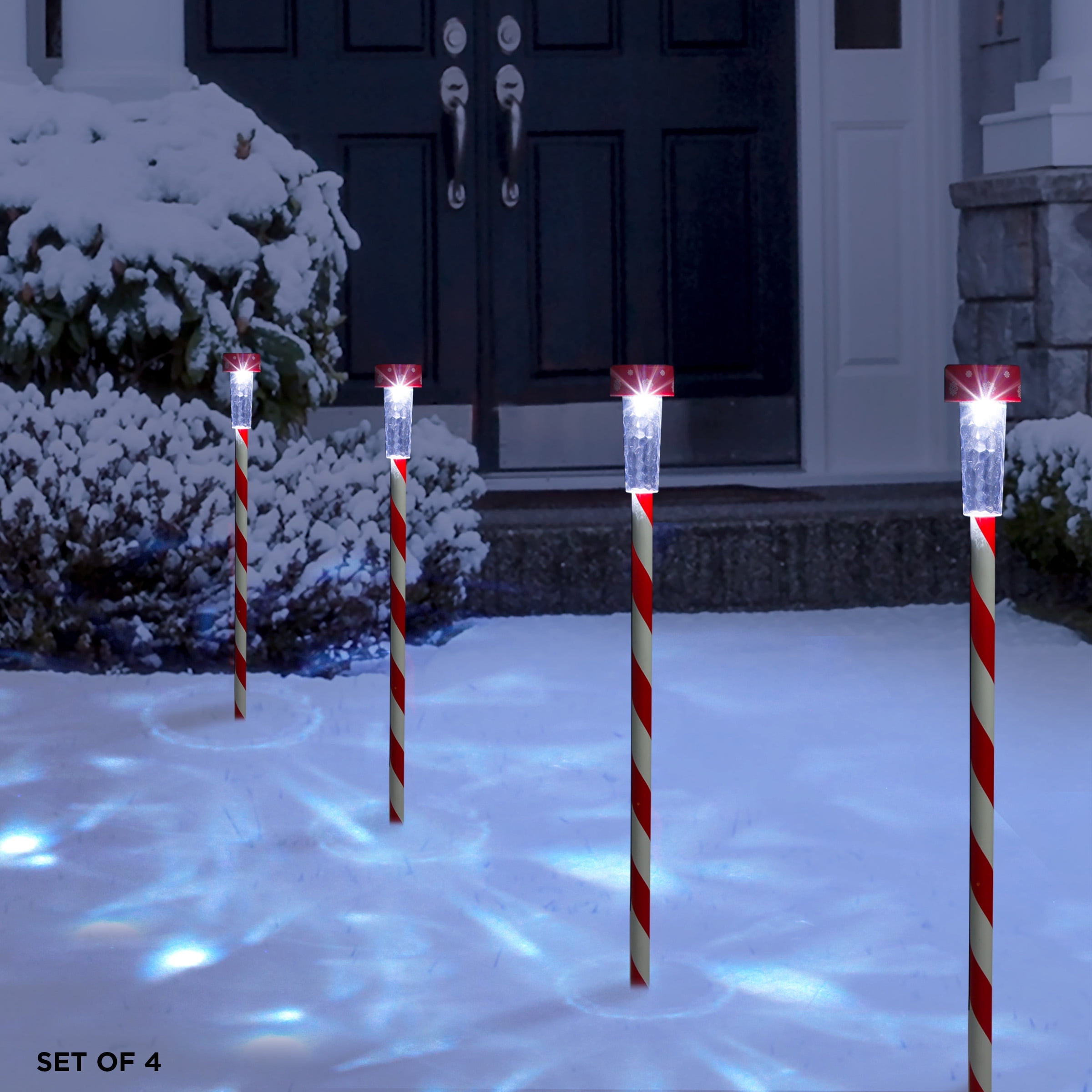 Alpine Corporation 27" Striped Plastic Solar Light-Up Holiday Garden Stakes, Set of 4, Red/White