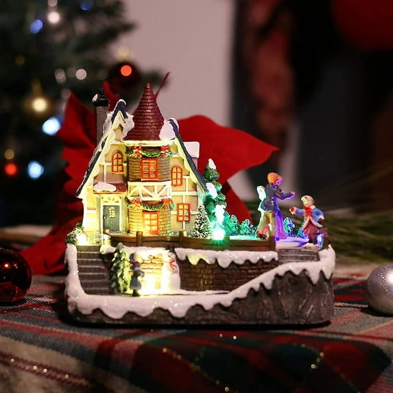 Alpine Corporation Christmas Village with Dancing Ice Skaters and Multi-Color LED Lights