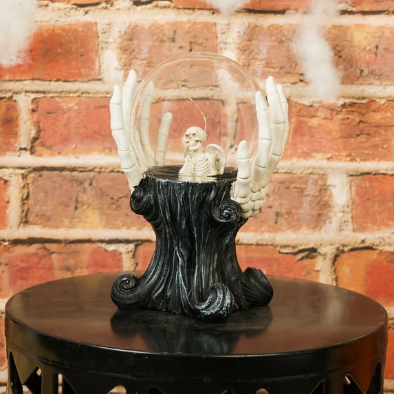 Alpine Corporation WQA1286CC 9" Tall Skeleton Hands Holding Magic Ball with Color Changing LED Lights, Tabletop Halloween Decoration with Timer Function, Indoor/Outdoor Spooky Decor