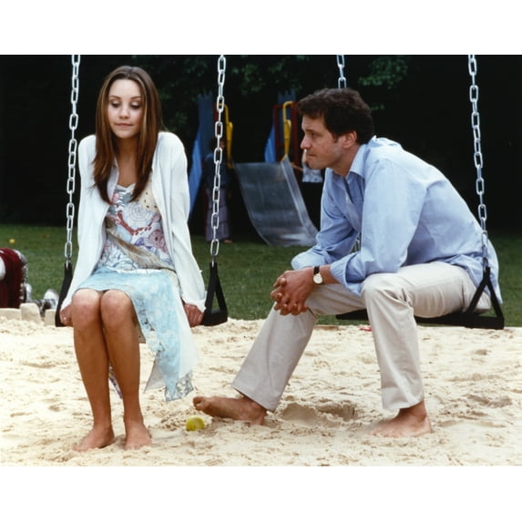 Amanda Bynes sitting on Swing Candid Photo Photo Print (24 x 30)
